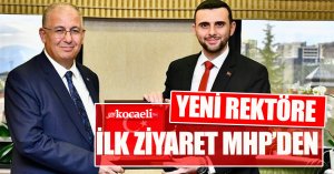 YENİ REKTÖRE İLK ZİYARET MHP'DEN