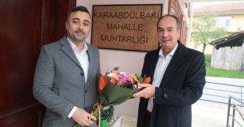 Büyükşehir’den, öğretmen emeklisi muhtarlara duygulandıran ziyaret 