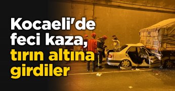 Kocaeli'de feci kaza, tırın altına girdiler