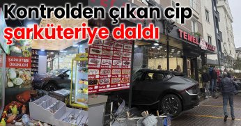 Kontrolden çıkan cip şarküteriye daldı: Kıl payı kurtuluş kamerada