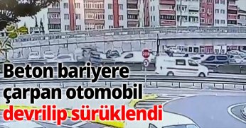 Beton bariyere çarpan otomobil devrilip sürüklendi, kaza anı kamerada