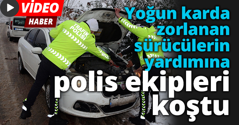 Yoğun karda zorlanan sürücülerin yardımına polis ekipleri koştu