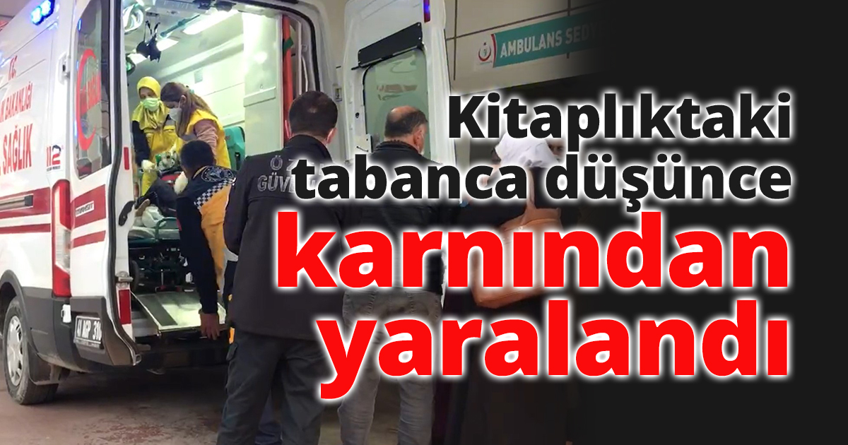 Kitaplıktaki tabanca düşünce karnından yaralandı