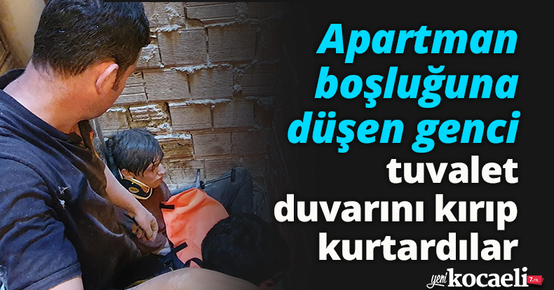 Apartman boşluğuna düşen genci tuvalet duvarını kırıp kurtardılar