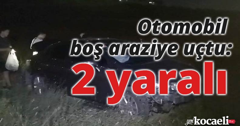 Sürücüsünün hakimiyetini kaybettiği otomobil boş araziye uçtu: 2 yaralı