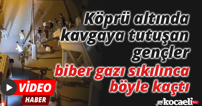 Köprü altında kavgaya tutuşan gençler, biber gazı sıkılınca böyle kaçtı