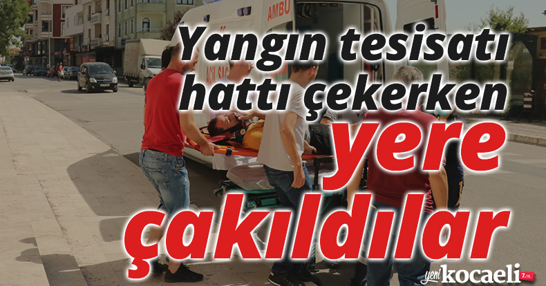 Yangın tesisatı hattı çekerken metrelerce yükseklikteki merdivenlerden yere çakıldılar