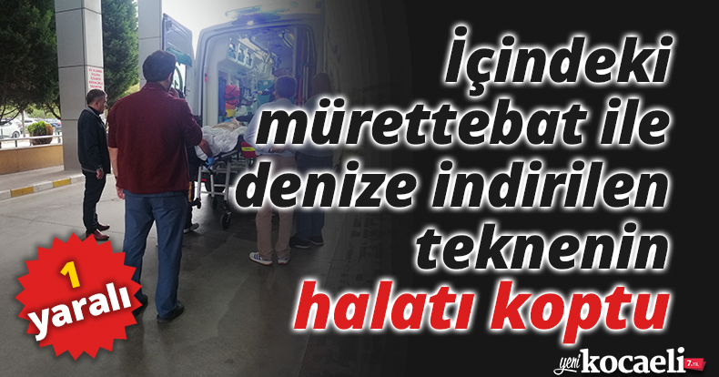 İçindeki mürettebat ile denize indirilen teknenin halatı koptu: 1 yaralı