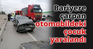 Bariyere çarpan otomobildeki çocuk yaralandı