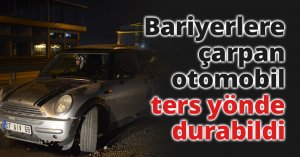 Bariyerlere çarpan otomobil ters yönde durabildi