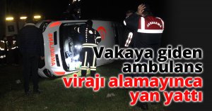 Vakaya giden ambulans virajı alamayınca yan yattı