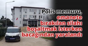 Polis memuru, emanete bırakılan silahı boşaltmak isterken bacağından yaralandı