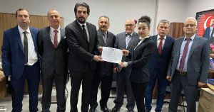 Okyay Mazbatasını Aldı.