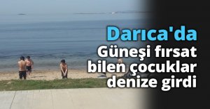 Darıca'da Güneşi fırsat bilen çocuklar denize girdi