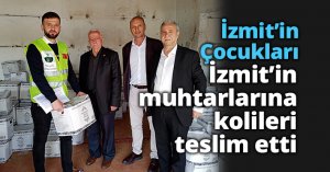 İzmit’in Çocukları İzmit’in muhtarlarına kolileri teslim etti