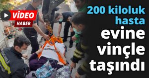 200 kiloluk hasta evine vinçle taşındı
