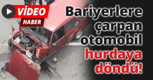 Bariyerlere çarpan otomobil hurdaya döndü, sıkışan yaralıları itfaiye ekipleri çıkardı