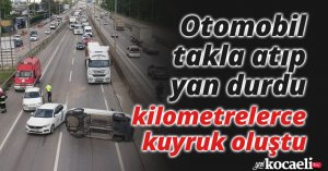 Otomobil takla atıp yan durdu, kilometrelerce kuyruk oluştu