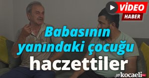 Babasının yanındaki çocuğu haczettiler