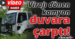 Virajı dönen kamyon duvara çarptı