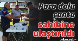 Para dolu çanta sahibine ulaştırıldı