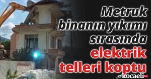 Metruk binanın yıkımı sırasında elektrik telleri koptu