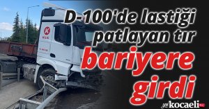D-100'de lastiği patlayan tır bariyere girdi, tonlarca ağırlıktaki demir rulolar yola düştü