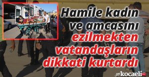 Hamile kadın ve amcasını ezilmekten vatandaşların dikkati kurtardı