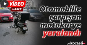 Otomobille çarpışan motokurye yaralandı