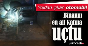 Yoldan çıkan otomobil binanın en alt katına uçtu