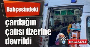 Bahçesindeki çardağın çatısı üzerine devrildi