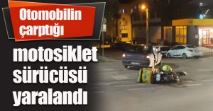 Otomobilin çarptığı motosiklet sürücüsü yaralandı