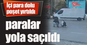 İçi para dolu poşet yırtıldı,paraları yola saçıldı