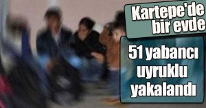 Kartepe'de bir evde  51 yabancı uyruklu yakalandı
