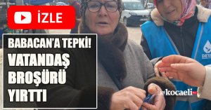 ALİ BABACAN’A TEPKİ VATANDAŞ BROŞÜRÜ YIRTTI