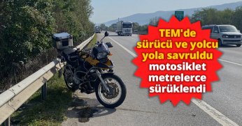 TEM'de sürücü ve yolcu yola savruldu, motosiklet metrelerce sürüklendi