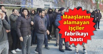 Maaşlarını alamayan işçiler fabrikayı bastı