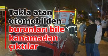 Takla atan otomobilden burunları bile kanamadan çıktılar