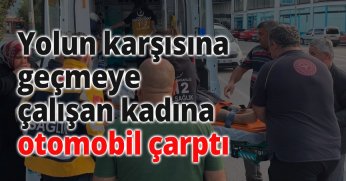 Yolun karşısına geçmeye çalışan kadına otomobil çarptı