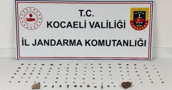 Durdurulan araçta tarihi eser niteliğinde sikke ve objeler bulundu