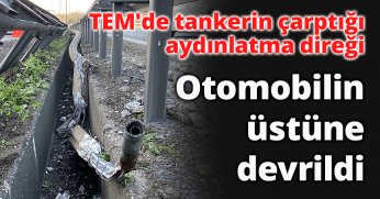 Otomobilin üstüne devrildi