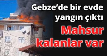 Bir evde yangın çıktı, mahsur kalanlar var