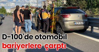 D-100'de otomobil bariyerlere çarptı